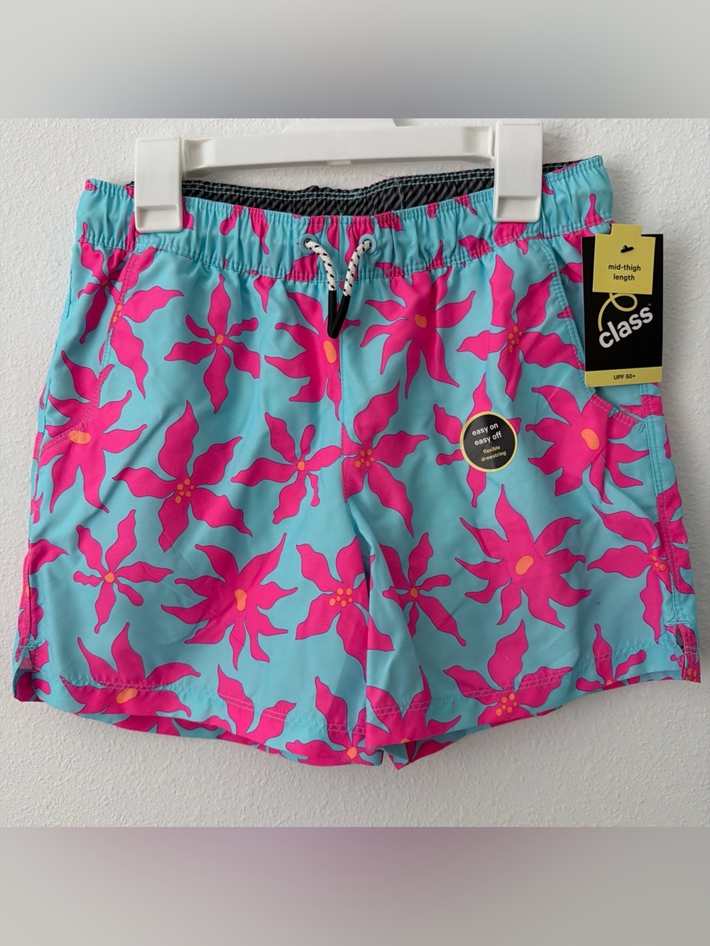 Boys Mid-Thigh Swim Shorts in Turquoise with Pink Floral Print